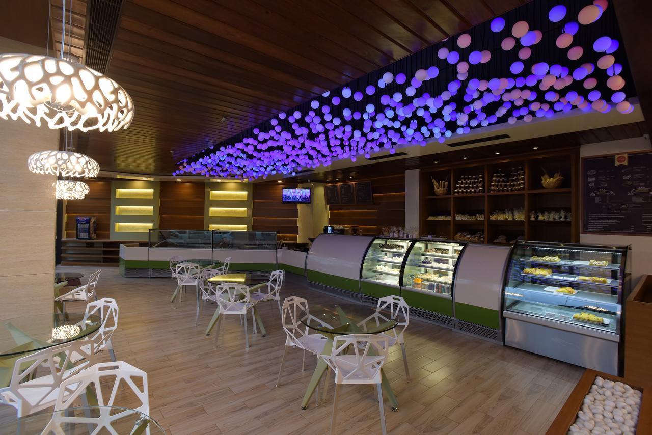 Hotel H - Sandhill Hotels Private Limited อานันด์ ภายนอก รูปภาพ